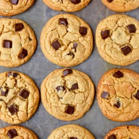 Three perfect rows of soft and chewy peanut butter chocolate chip cookies.