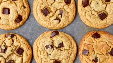 Three perfect rows of soft and chewy peanut butter chocolate chip cookies.