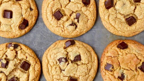 Three perfect rows of soft and chewy peanut butter chocolate chip cookies.