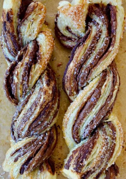 A close-up of Nutella twists made with puff pastry and sanding sugar on top