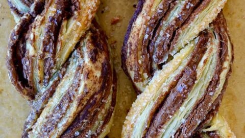 A close-up of Nutella twists made with puff pastry and sanding sugar on top