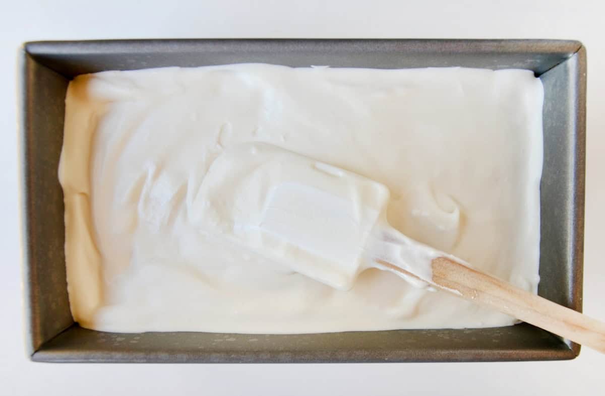 No-churn vanilla ice cream in a loaf pan.
