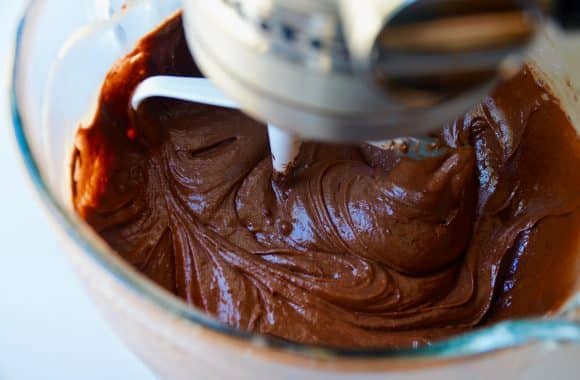 Chocolate cupcake batter in a KitchenAid stand mixer