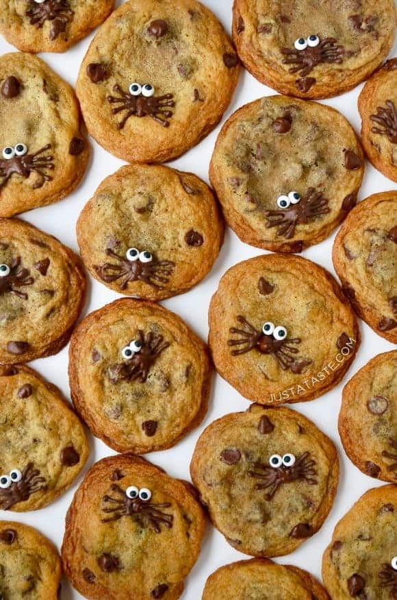Spider Chocolate Chip Cookies arranged on a white background