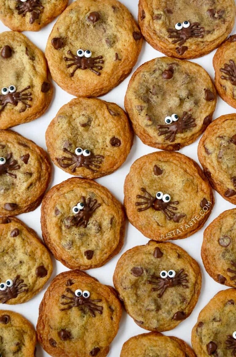 Spider Chocolate Chip Cookies arranged on a white background
