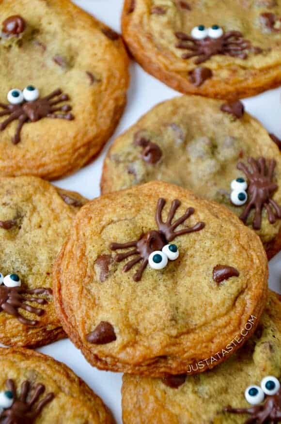 A close-up of Spider Chocolate Chip Cookies stacked on top of each other