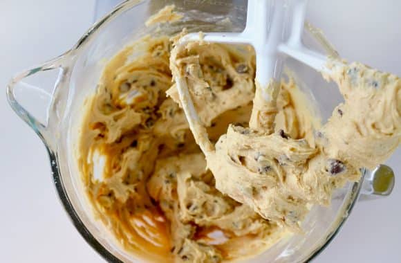 Chocolate chip cookie dough in a stand mixer