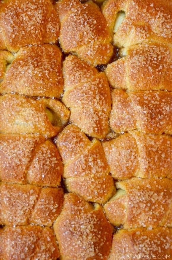 A pan of Crescent Roll Apple Dumplings studded with sanding sugar