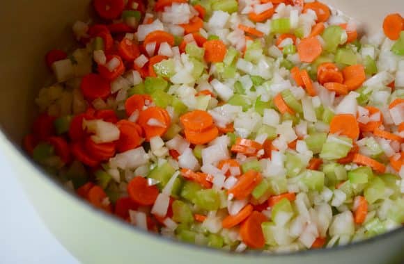Carrots, onions and celery in a stock pot