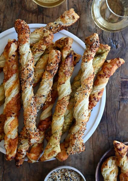 A platter of cheese twists made with puff pastry.