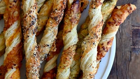 A platter of cheese twists made with puff pastry.