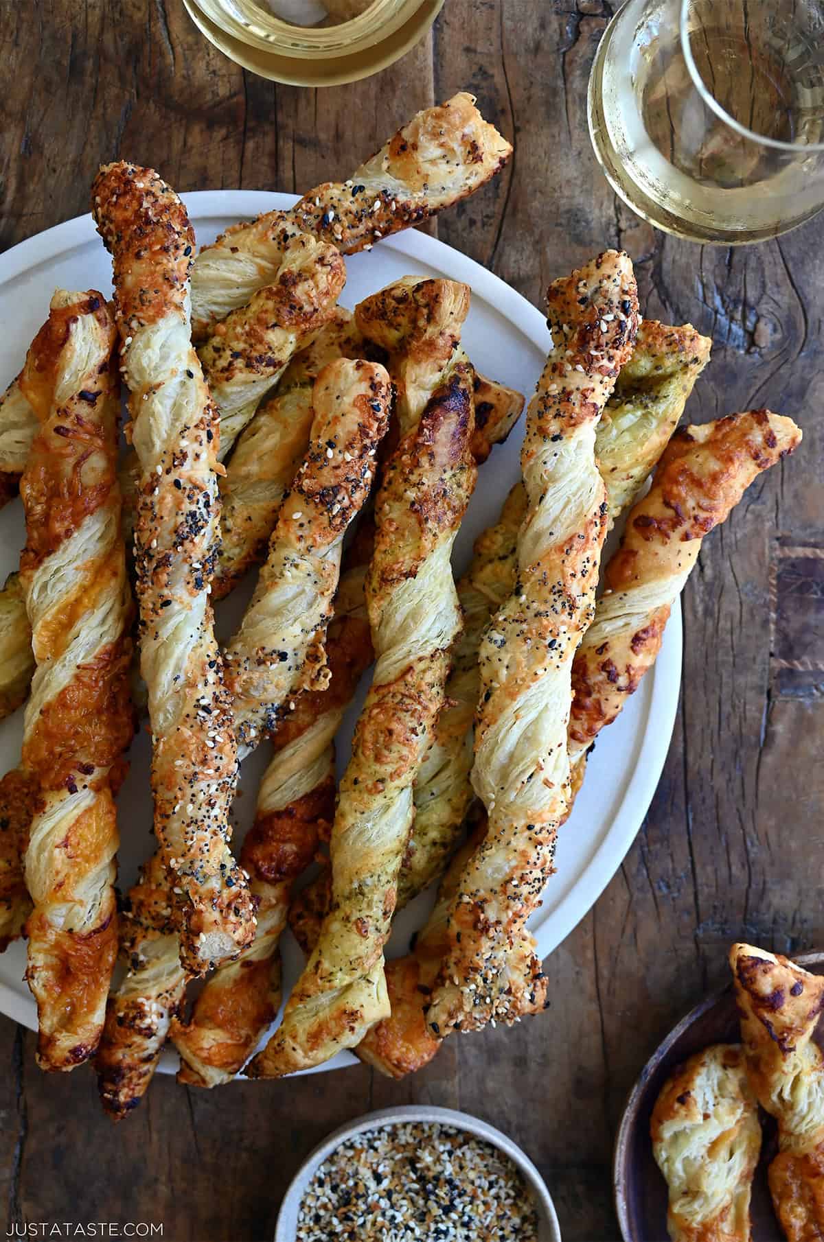 A platter of cheese twists made with puff pastry.