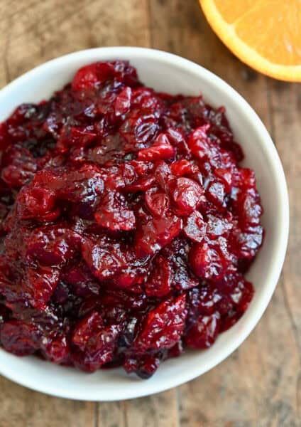 Cranberry orange sauce in a white serving bowl.