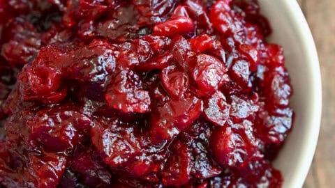 Cranberry orange sauce in a white serving bowl.