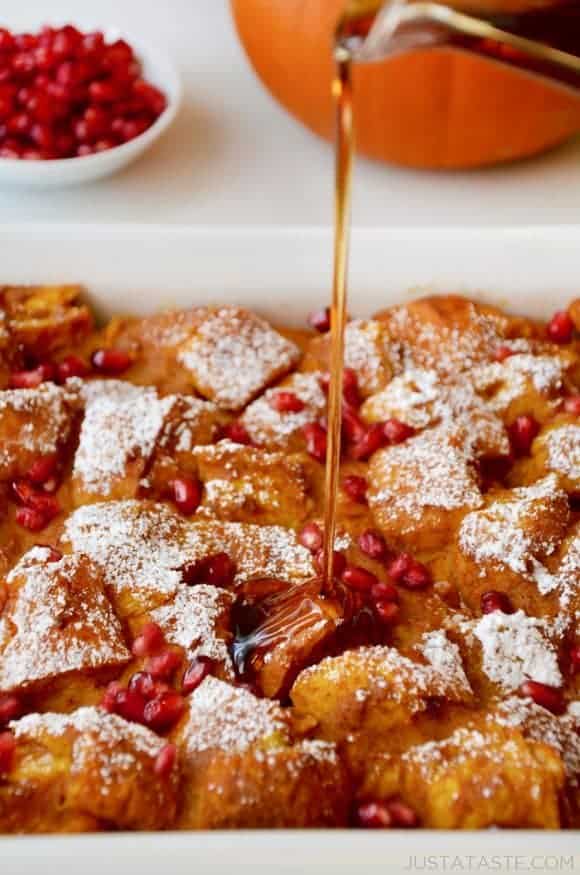 Syrup being poured onto pumpkin French toast casserole