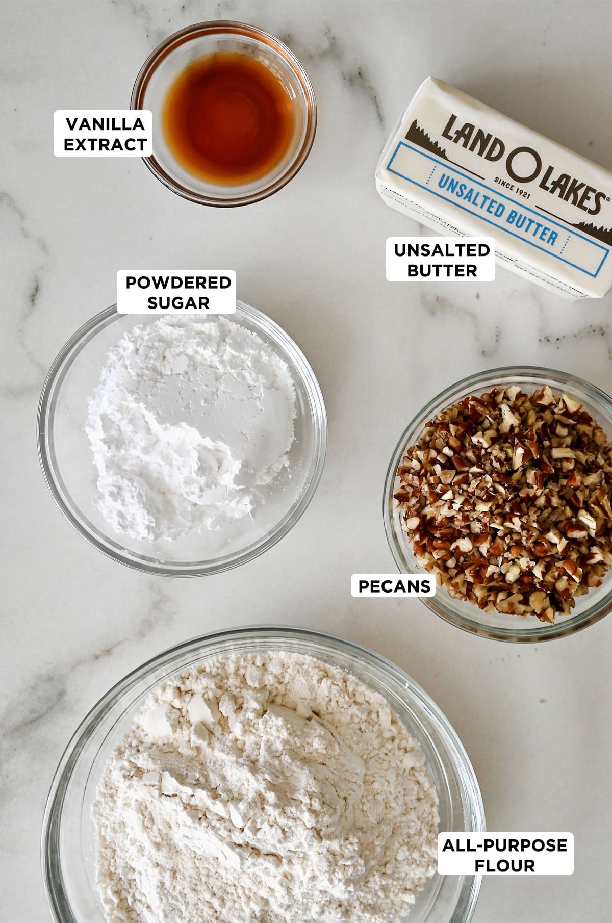 Ingredients to make snowball cookies.