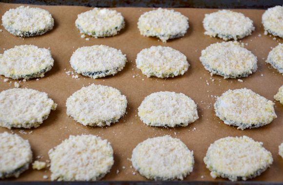 Parmesan Zucchini Chips on baking sheet prior to being baked.