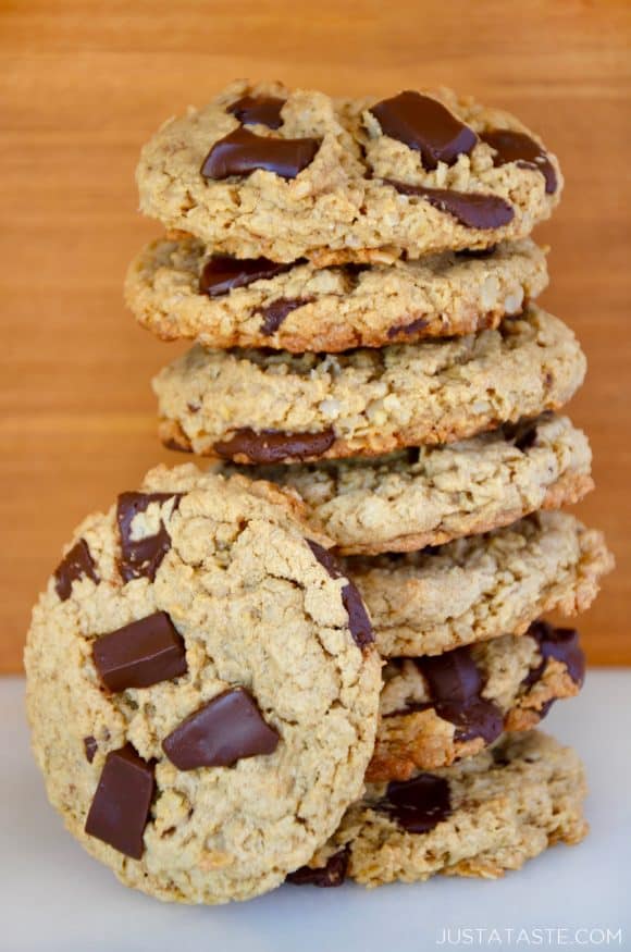 Stack of Flourless Oatmeal Chocolate Chip Cookies with one cookie on its side leaning against the stack.