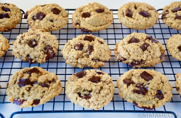 Flourless oatmeal chocolate chip cookies cooling on wire rack.