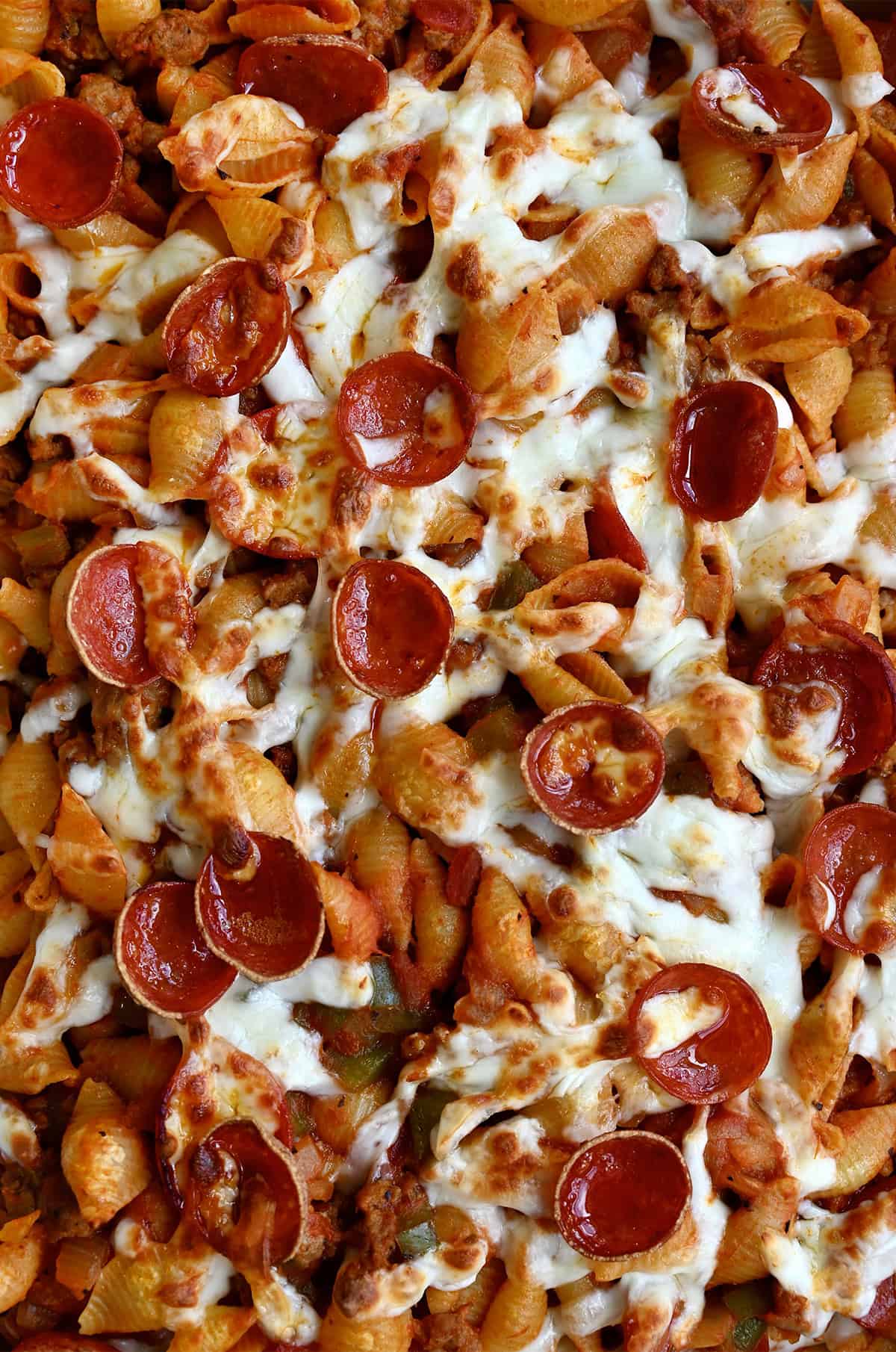 Homemade pizza casserole starring crisp mini pepperoni, melty mozzarella cheese and pasta.
