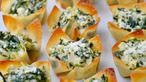 Spinach-Artichoke Dip Wonton Cups on white plate