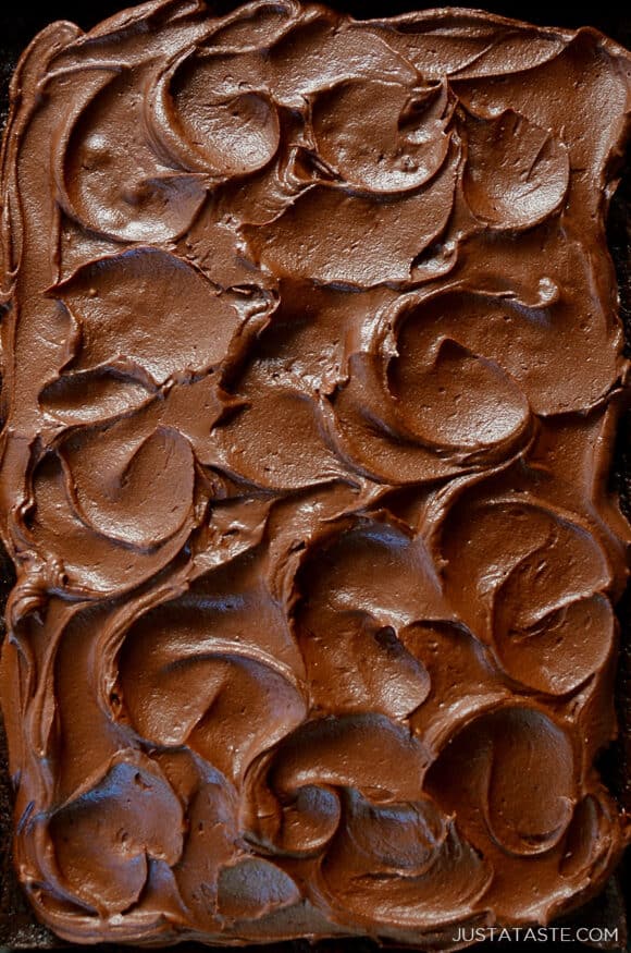 A close up view of swirled chocolate buttercream frosting