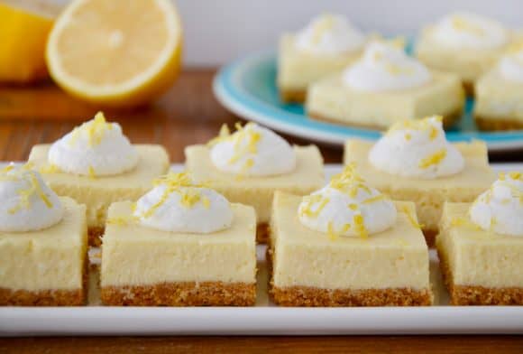 Easy Lemon Cheesecake Bars on white serving platter