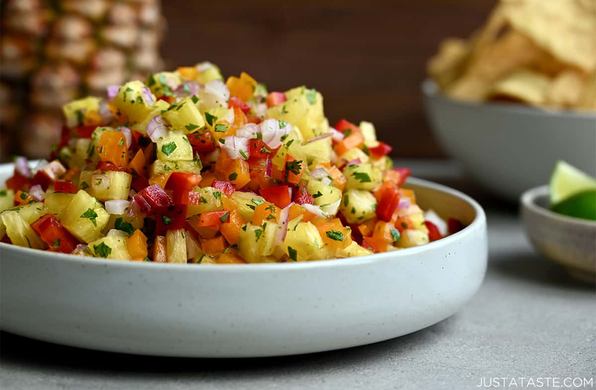 Pineapple salsa in a white bowl.