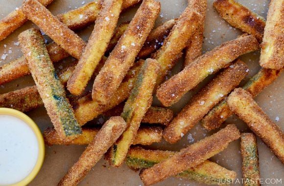 Stack of Crispy Baked Zucchini Fries with Ranch dressing