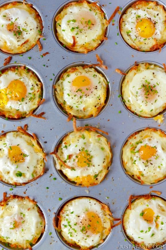 Cheesy Hash Brown Cups with Baked Eggs in a muffin tin