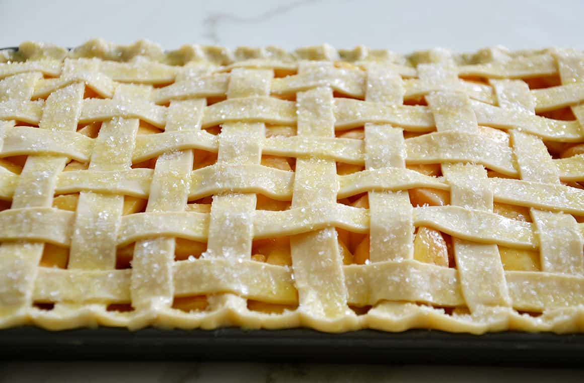 A lattice pie crust with sanding sugar