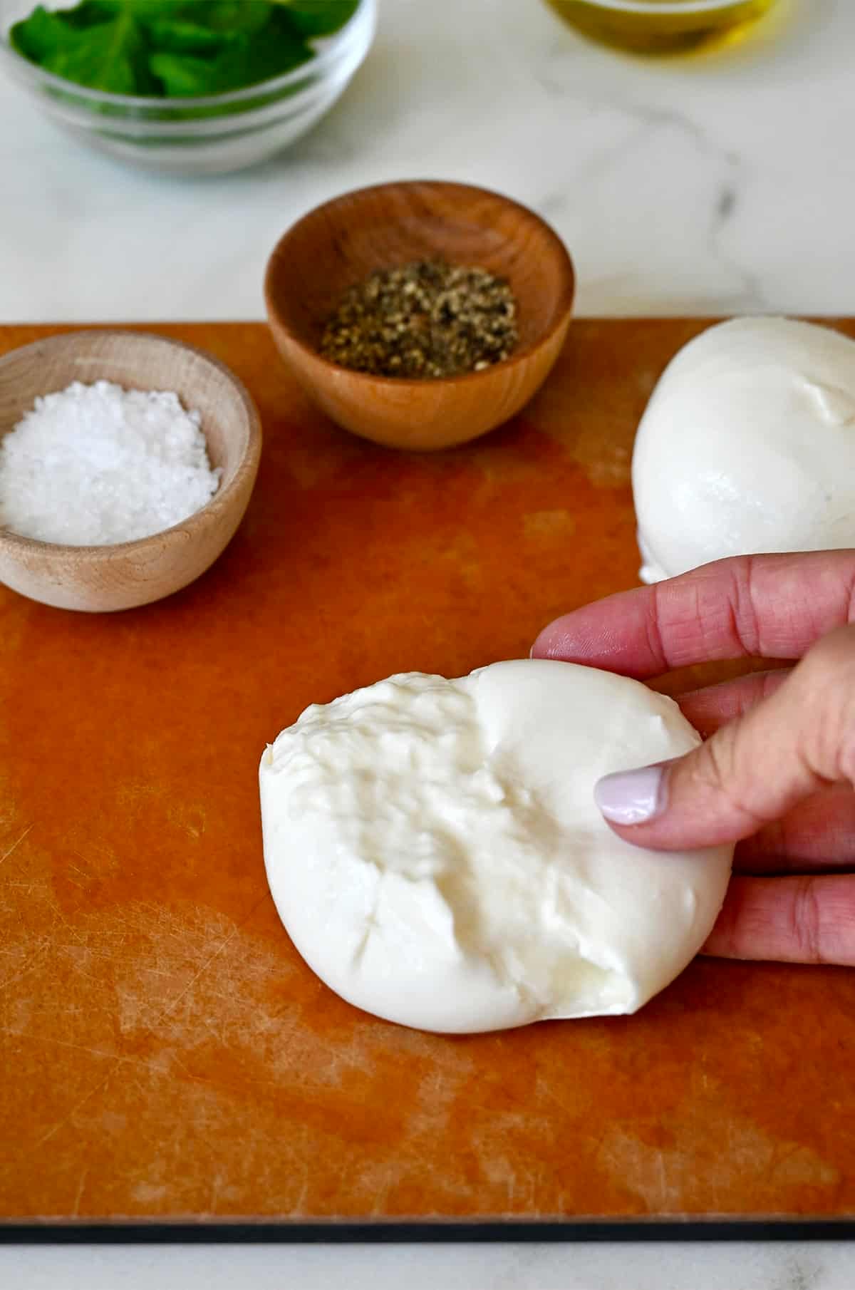 Creamy burrata cheese for Caprese salad.