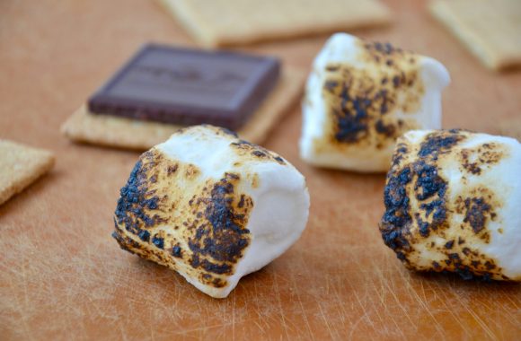 Toasted marshmallows on a cutting board