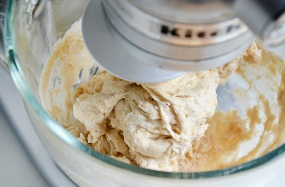 Easy Homemade Soft Pretzel Bites dough in stand mixer bowl