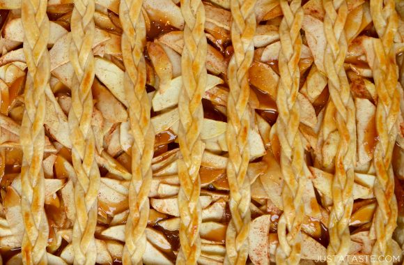 A close-up of a braided lattice apple slab pie