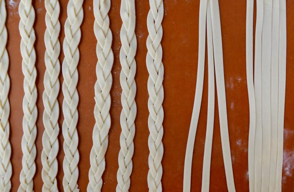 Strips of pie dough formed into braids