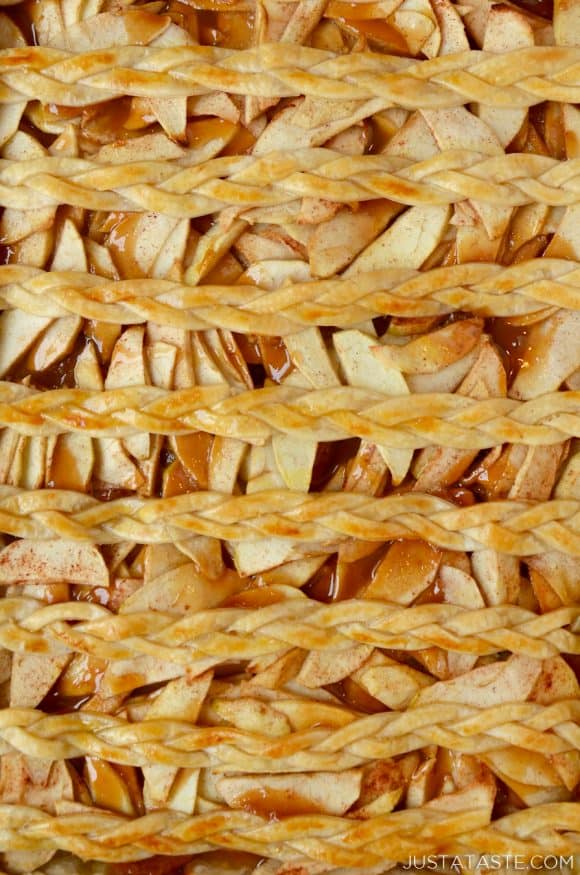 A close-up of caramel apple slab pie with braided lattice