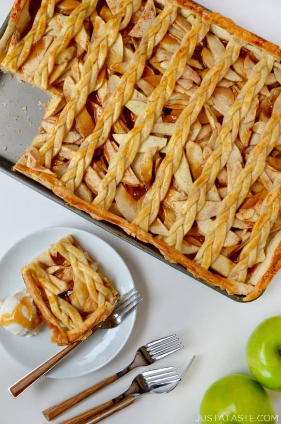 A caramel apple slab pie with a piece cut out