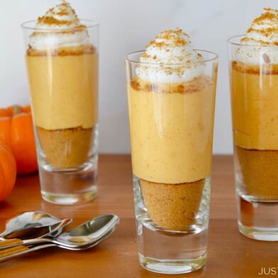 Three individual No-Bake Pumpkin Cheesecake Parfaits