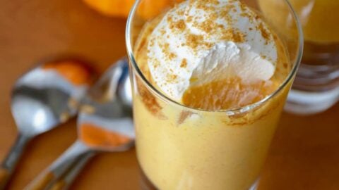 No-Bake Pumpkin Cheesecake Parfaits topped with whipped cream