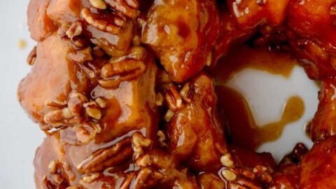 Easy Pecan Monkey Bread on white serving plate