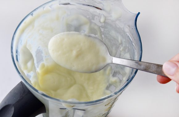 Blender with Quick Cauliflower Soup and spoon