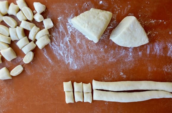 Cutting mashed potato gnocchi 