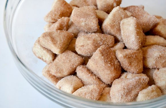 Monkey bread biscuit pieces coated in cinnamon-sugar 