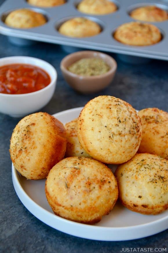 Muffin Tin Pizza Pockets on plate with marinara sauce