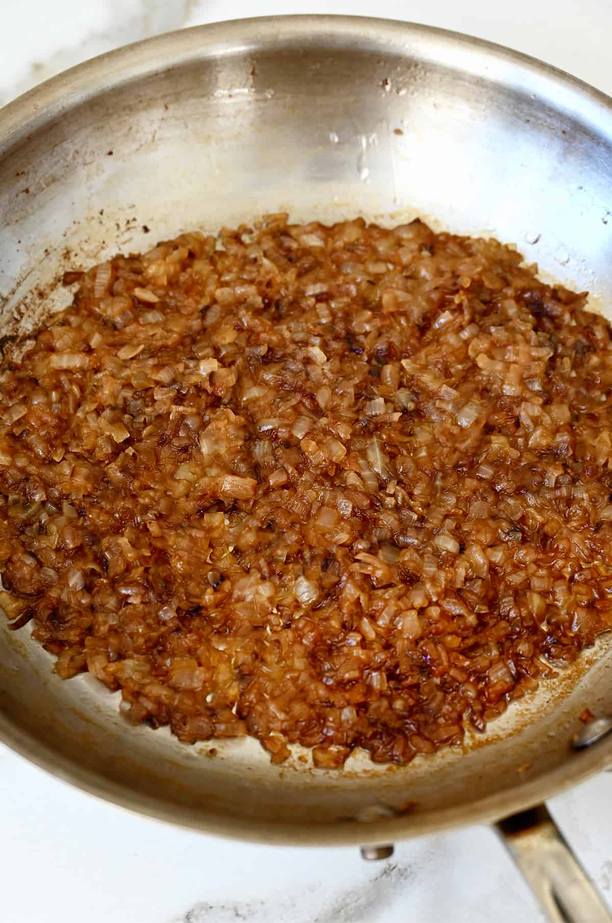 Caramelized onions in a skillet.