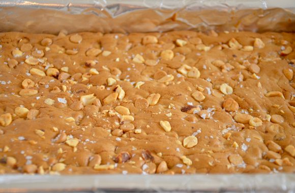 Closeup of foil-lined baking sheet with Double Peanut Butter Blondies 
