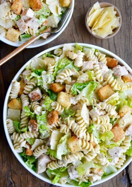 A bowl containing the best Chicken Caesar Pasta Salad.