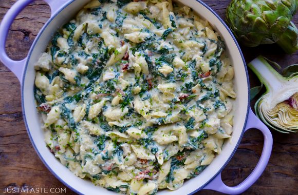 Top down view of saucepot with Spinach Artichoke Dip Pasta with Chicken