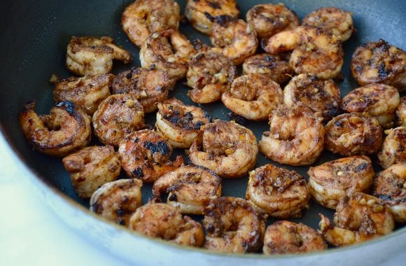 Sauté pan with spicy shrimp